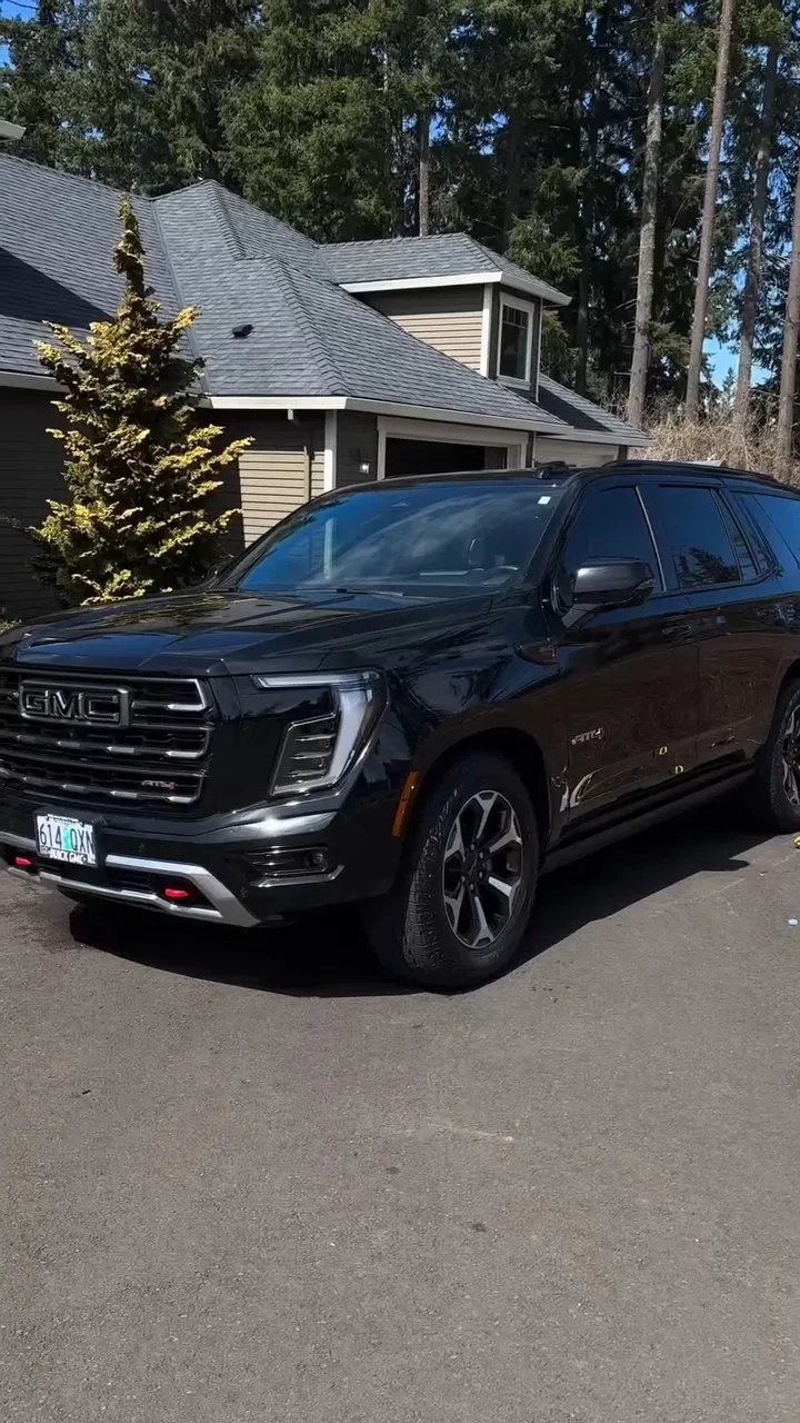 Black GMC detailed at the customer driveway